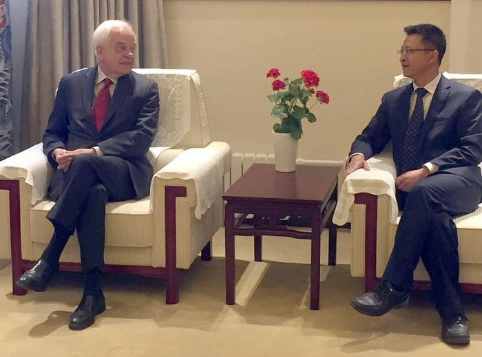 Canadian Ambassador to China John McCallum chats with He Jinsong, president of the Beijing Institute of Education.