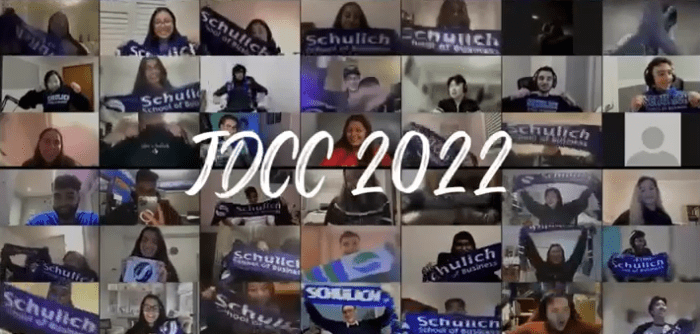Screen shot of Schulich's 2022 JDCC delegates waving school swag over Zoom.