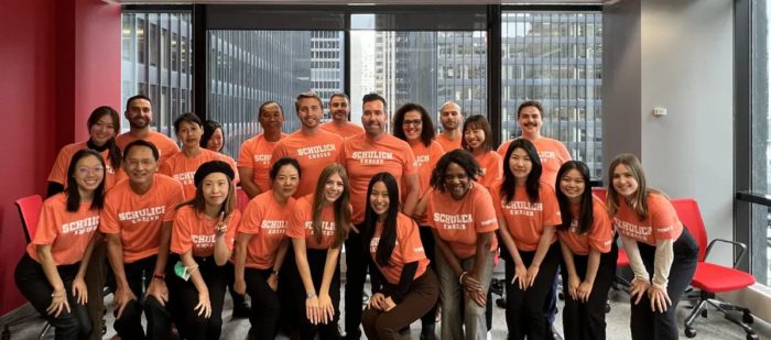 team wears their orange shirts for National Truth and Reconciliation day