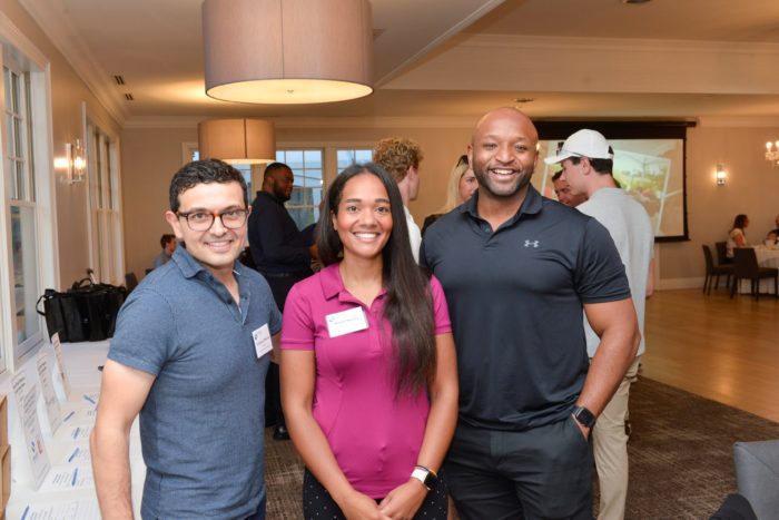 Anthony Ottavino (iBBA ’07, MBA ’11), Kristin Murray, and Michael Lewis (MBA ’09) at Golf Classic 2022