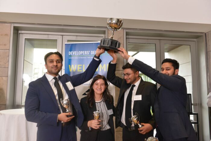The 2023 Developers' Den winners pose with the trophy