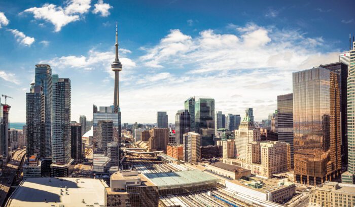 A panoramic image of Toronto's cityscape.