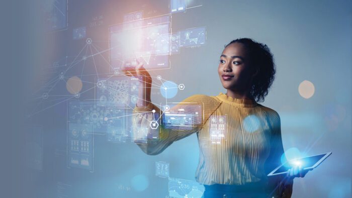 A woman interacting with a futuristic holographic interface.