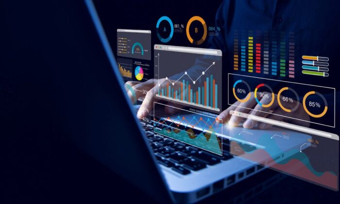 Analyst working with computer in Business Analytics and Data Management System with KPI and metrics connected to the database for technology finance, operations, sales, marketing. Data analysis.Ai