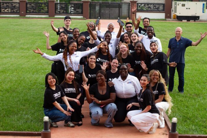 students in Ghana wearing Schulich shirts 